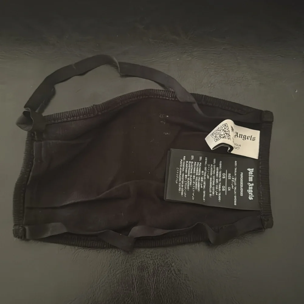 Authentic palm angels face mask comes with original bag.